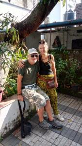 a man and a woman sitting on a bench at Cukoos Nest in Cochin