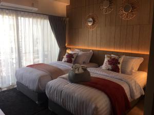 Tree​ for​ rest​ poshtel客房内的一张或多张床位