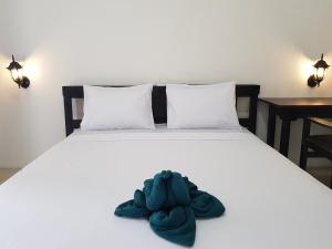 Postel nebo postele na pokoji v ubytování Talent Resort