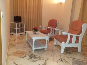 Télévision ou salle de divertissement dans l'établissement Hotel Anfiteatro Romano