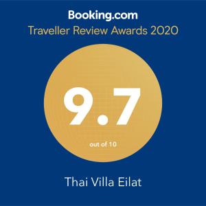einem gelben Kreis mit der Nummer siebzig in der Unterkunft Thai villa eilat - וילה תאי אילת in Eilat