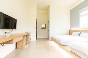Llit o llits en una habitació de Blue Lagoon
