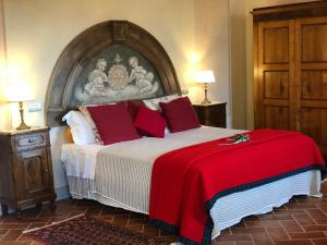 Posteľ alebo postele v izbe v ubytovaní La Cantina Relais - Fattoria Il Cipresso
