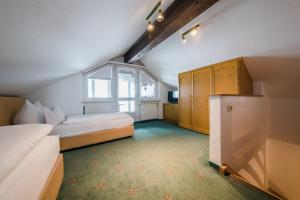 Postel nebo postele na pokoji v ubytování Hotel Sonnenheim