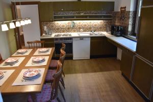 Kuchyň nebo kuchyňský kout v ubytování Landhaus am Pyhrn