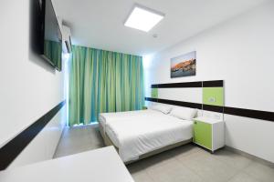 Voodi või voodid majutusasutuse HI - Bnei Dan - Tel Aviv Hostel toas