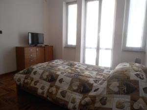 Posteľ alebo postele v izbe v ubytovaní Appartamento tra mare e montagna