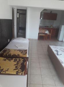 Ein Bett oder Betten in einem Zimmer der Unterkunft Apartments Vrša
