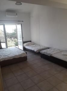 Ein Bett oder Betten in einem Zimmer der Unterkunft Apartments Vrša