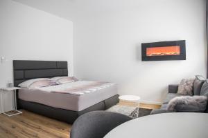 Posteľ alebo postele v izbe v ubytovaní Main Square Modern Apartments
