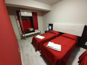 Postel nebo postele na pokoji v ubytování Hotel Casale dei Greci