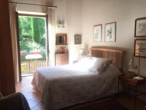 A bed or beds in a room at Villa Balducci Még 31 kép
