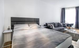 Posteľ alebo postele v izbe v ubytovaní Main Square Modern Apartments