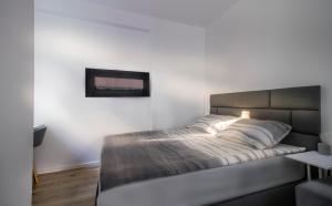 Posteľ alebo postele v izbe v ubytovaní Main Square Modern Apartments