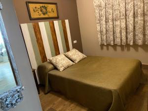 Ένα ή περισσότερα κρεβάτια σε δωμάτιο στο Casa Rural La Marquesa - Cuenca