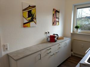 Ett kök eller pentry på Strietpartment - 2 Schlafzimmer, viel Raum und Ruhe