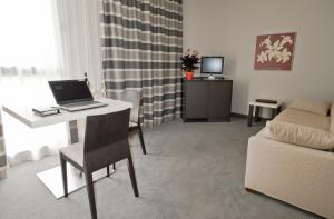 TV a/nebo společenská místnost v ubytování Hotel Rivarolo