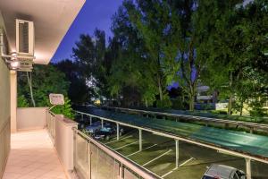 a view of a swimming pool from a balcony at IRIS Olimp in Olimp