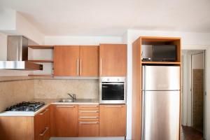 A kitchen or kitchenette at IseoLakeRental - La Stallina - Monte Isola