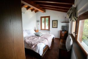 Postel nebo postele na pokoji v ubytování IseoLakeRental - La Stallina - Monte Isola