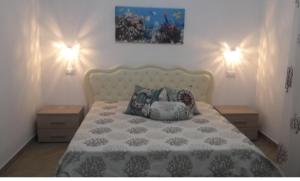 Säng eller sängar i ett rum på Mediterranea Guest House