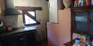 Kuchyň nebo kuchyňský kout v ubytování Casa Aljez