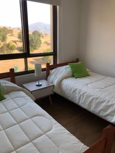 Ένα ή περισσότερα κρεβάτια σε δωμάτιο στο Costa Puyai II Departamento 5 piso