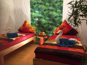 En eller flere senge i et værelse på XXL Deluxe Living 125qm bei Nürnberg