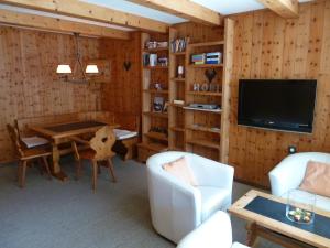 Televiisor ja/või meelelahutuskeskus majutusasutuses Apartment Bolgenblick