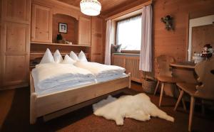 Postel nebo postele na pokoji v ubytování Garni Cir + 37 fotografií