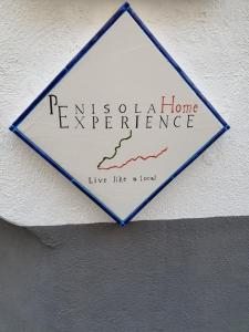 Certifikát, ocenenie alebo iný dokument vystavený v ubytovaní Penisola Home Experience