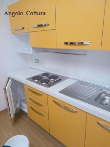 A kitchen or kitchenette at Residence Delta