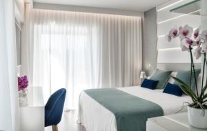 Postel nebo postele na pokoji v ubytování Atlantic Hotel & SPA