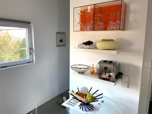 O bucătărie sau chicinetă la Modernes Studio auf der Sonnenterrasse