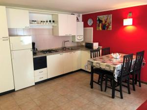 Kuchyň nebo kuchyňský kout v ubytování Dimora Le Colline
