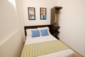 Voodi või voodid majutusasutuse Hotel Maranata Valledupar toas