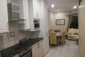 Η κουζίνα ή μικρή κουζίνα στο Cabanas 64
