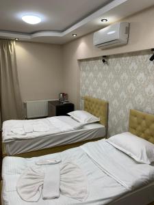 Postel nebo postele na pokoji v ubytování 7 Baits Hotel