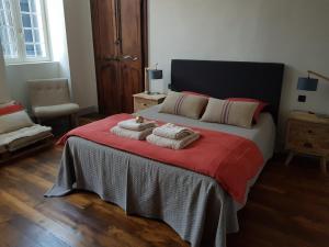 Postel nebo postele na pokoji v ubytování VANILLE CAFE CHOCOLAT