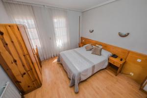 Postel nebo postele na pokoji v ubytování Alvi