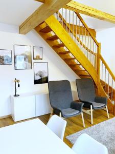 
Posezení v ubytování Mezonetový apartmán ve skandinávském stylu
