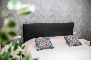 Postel nebo postele na pokoji v ubytování Dubrovnik Spectrum Rooms