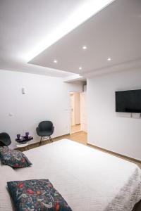 TV a/nebo společenská místnost v ubytování Dubrovnik Spectrum Rooms