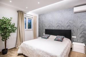 Postel nebo postele na pokoji v ubytování Dubrovnik Spectrum Rooms
