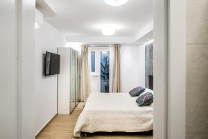 Postel nebo postele na pokoji v ubytování Dubrovnik Spectrum Rooms