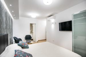 TV a/nebo společenská místnost v ubytování Dubrovnik Spectrum Rooms