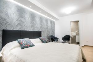 Postel nebo postele na pokoji v ubytování Dubrovnik Spectrum Rooms