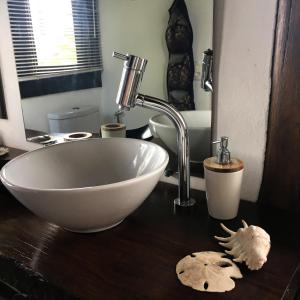 Phòng tắm tại Casa Jardim Barra De Ibiraquera