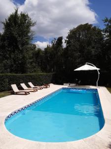 Het zwembad bij of vlak bij Casa Simona Villa General Belgrano