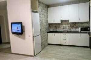 Una cocina o kitchenette en Loft 2кімнатні Апартаменти Сучасний ремонт WiFi